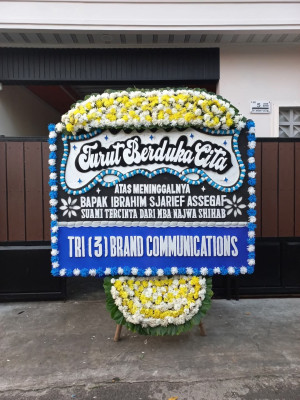 Papan Bunga Duka di Cikelat